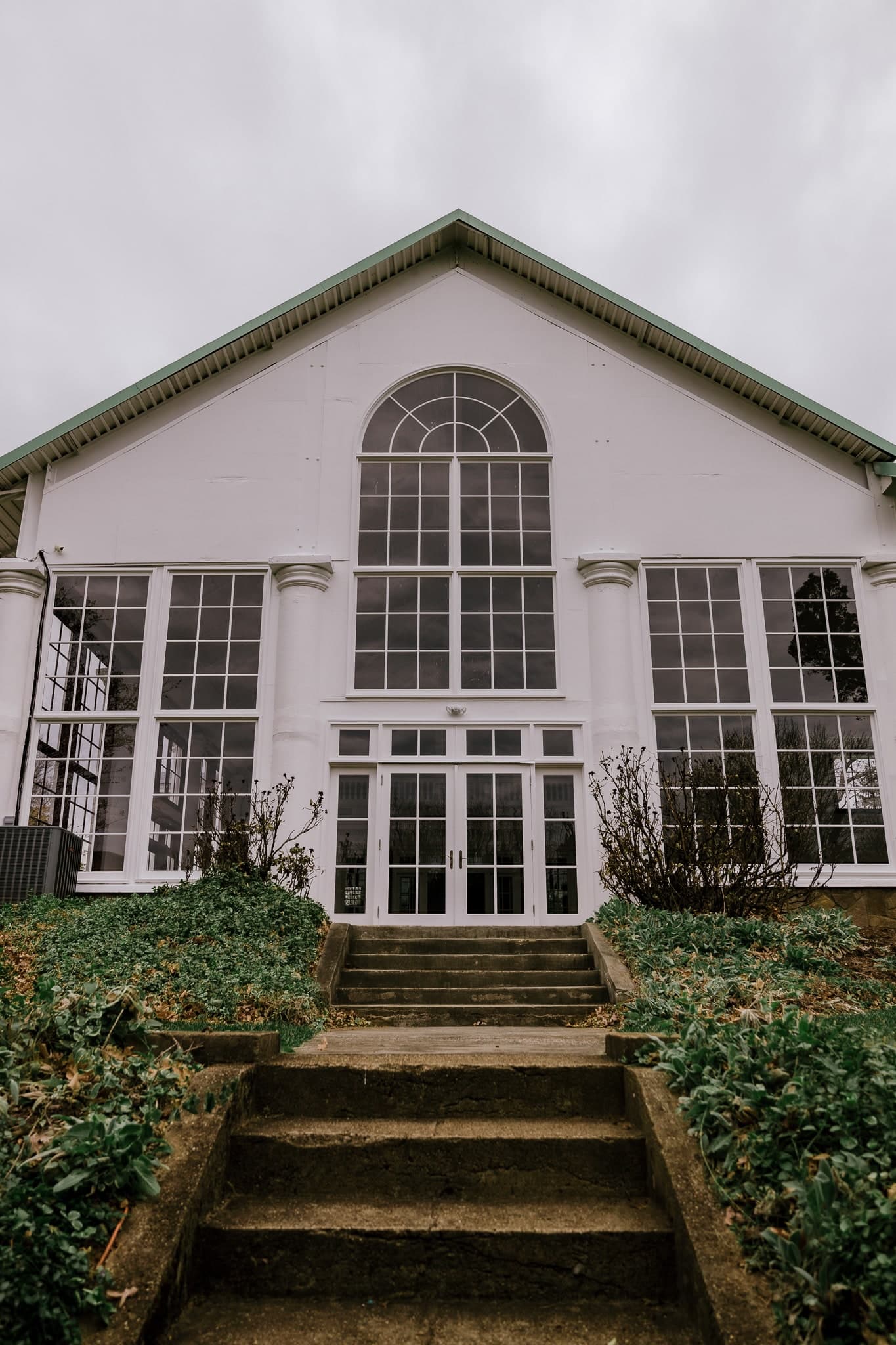 Glasshouse venue with its arched window and stone steps