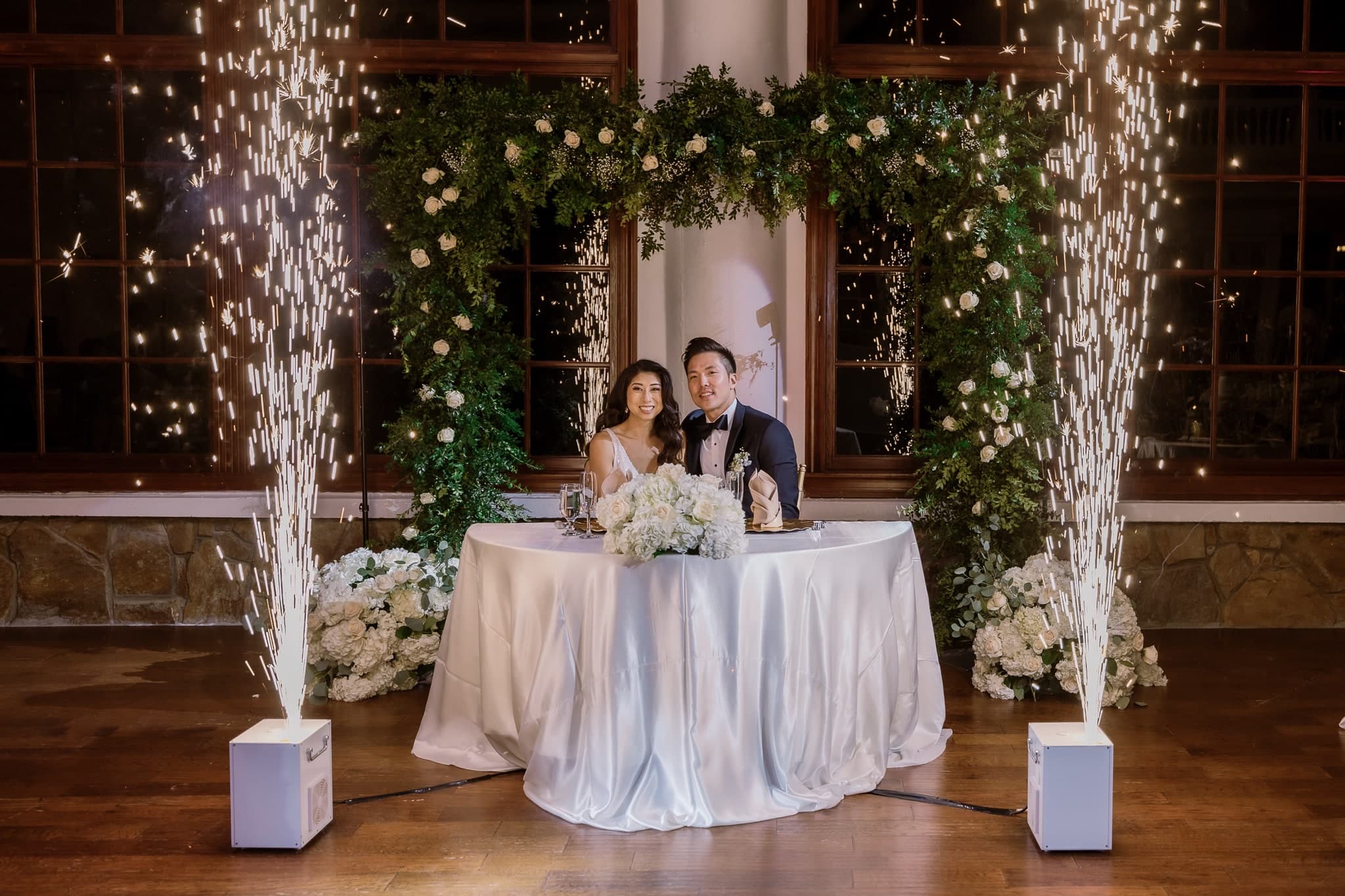 Sparklers framing the sweetheart table