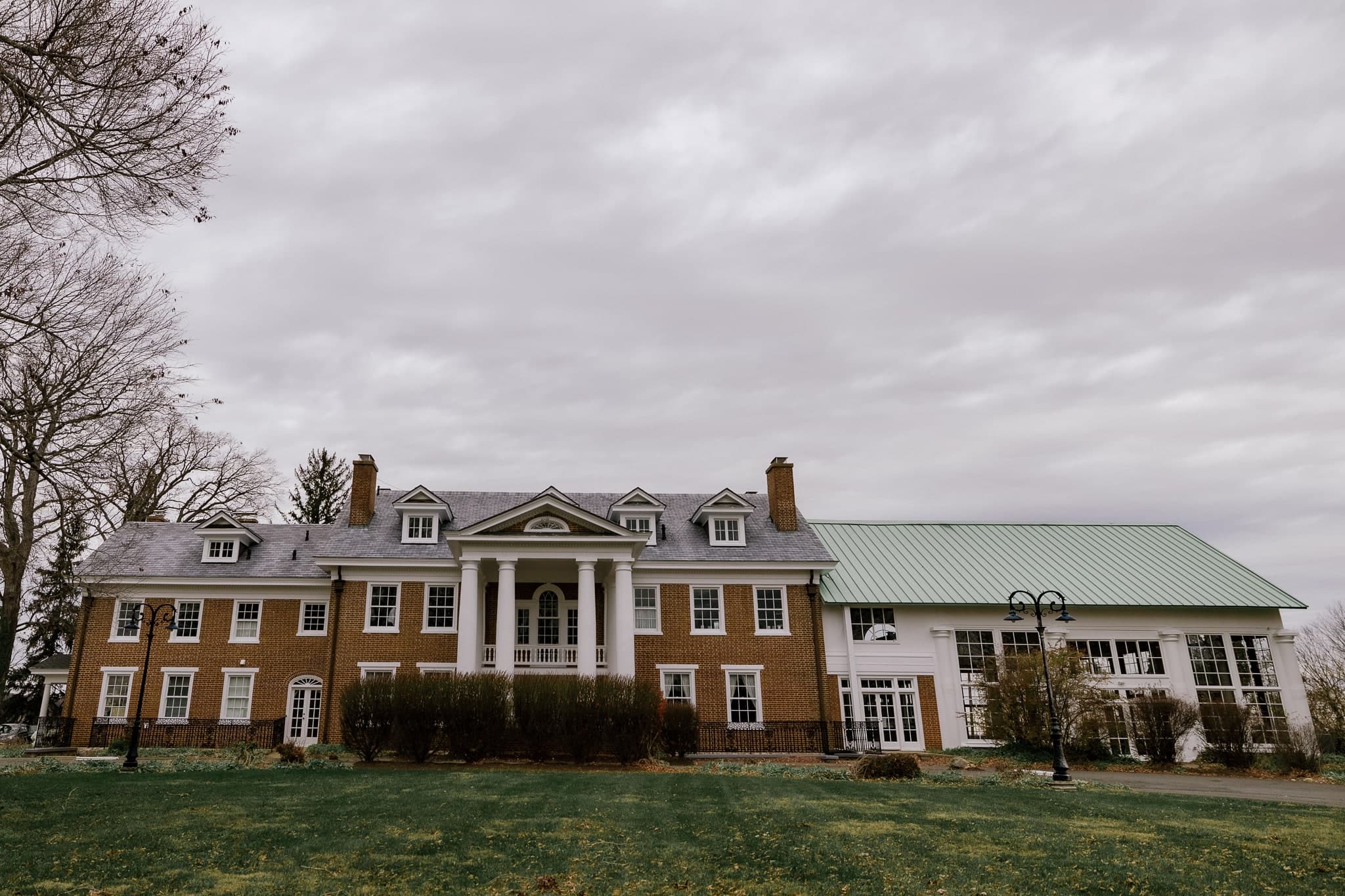 Estate mansion and grounds on a winter day