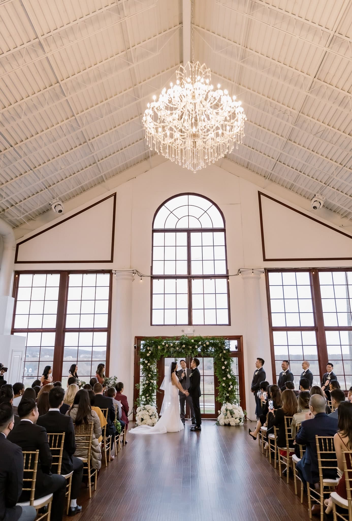 Guests seated for the glasshouse ceremony