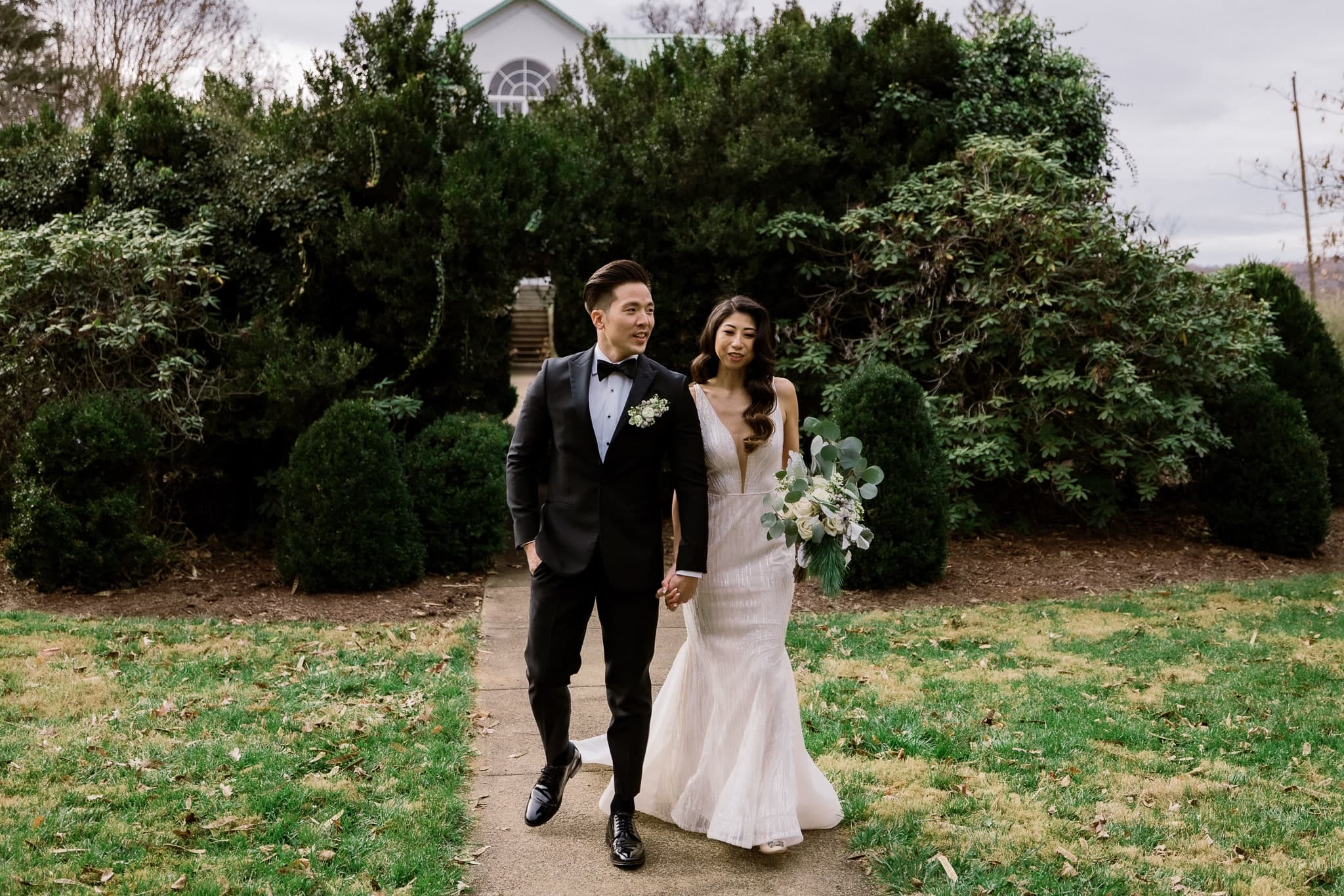 Couple walking through the garden