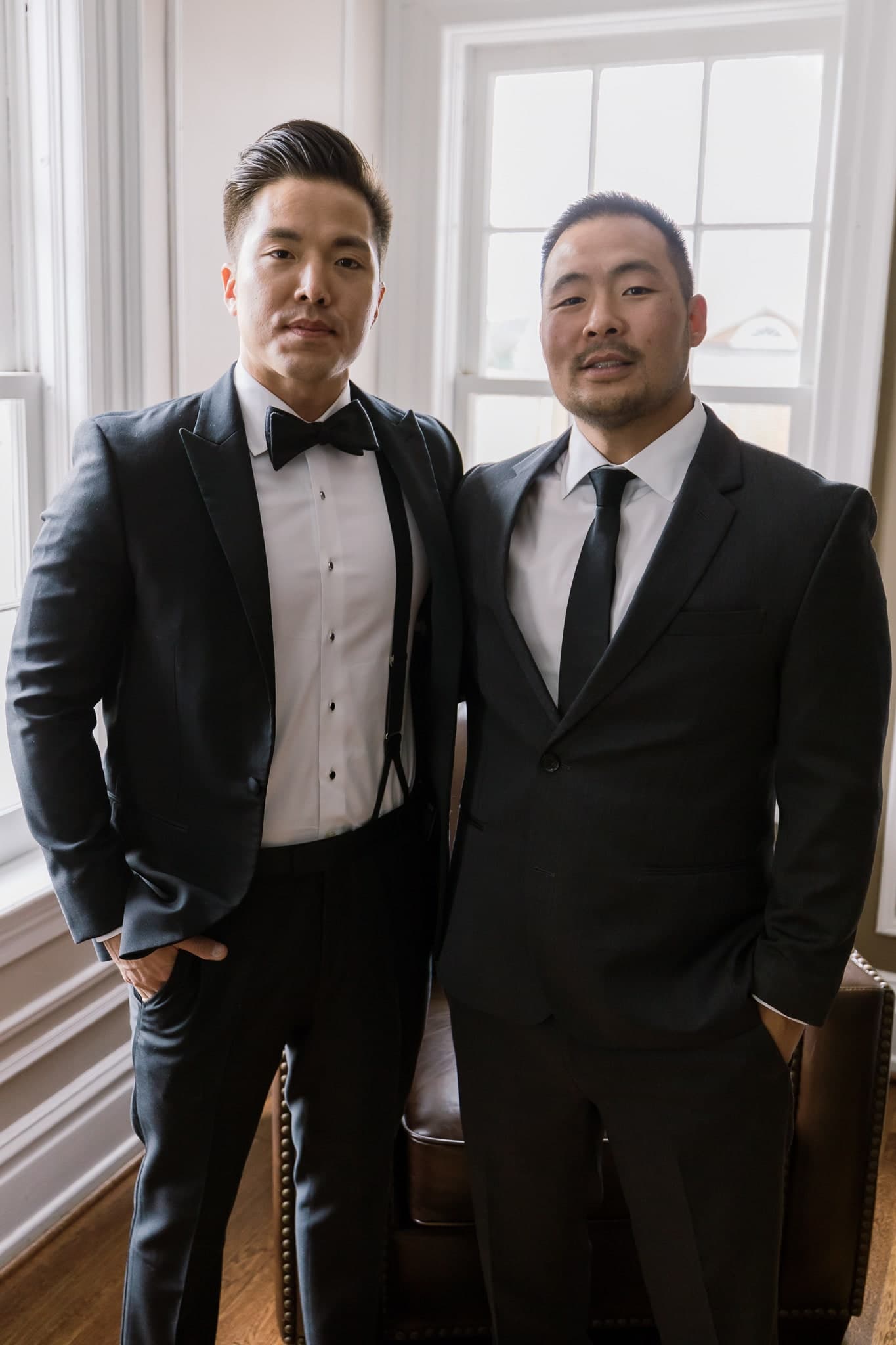 Groom with a friend by the window