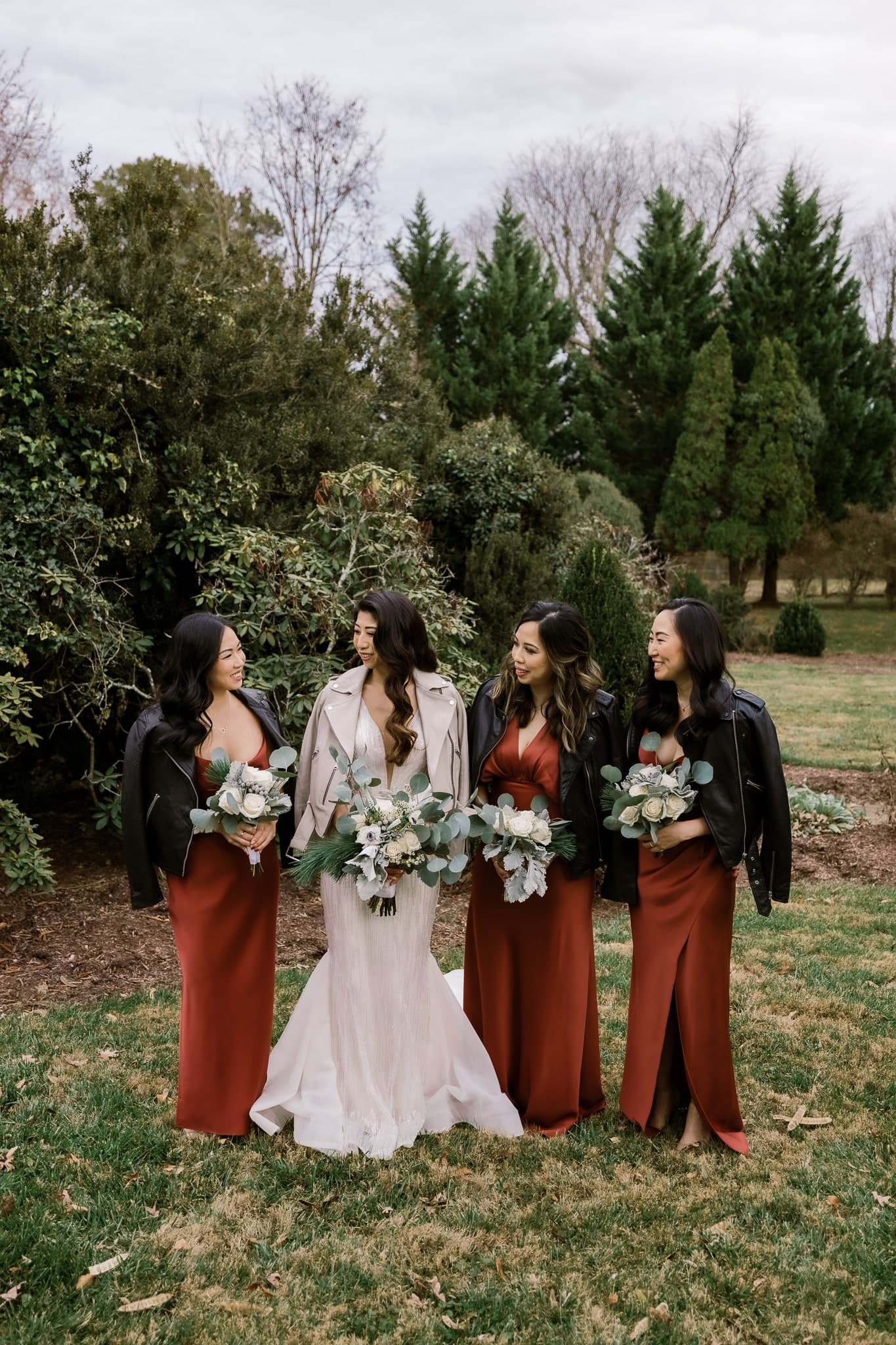 Bridesmaids gathered around the bride